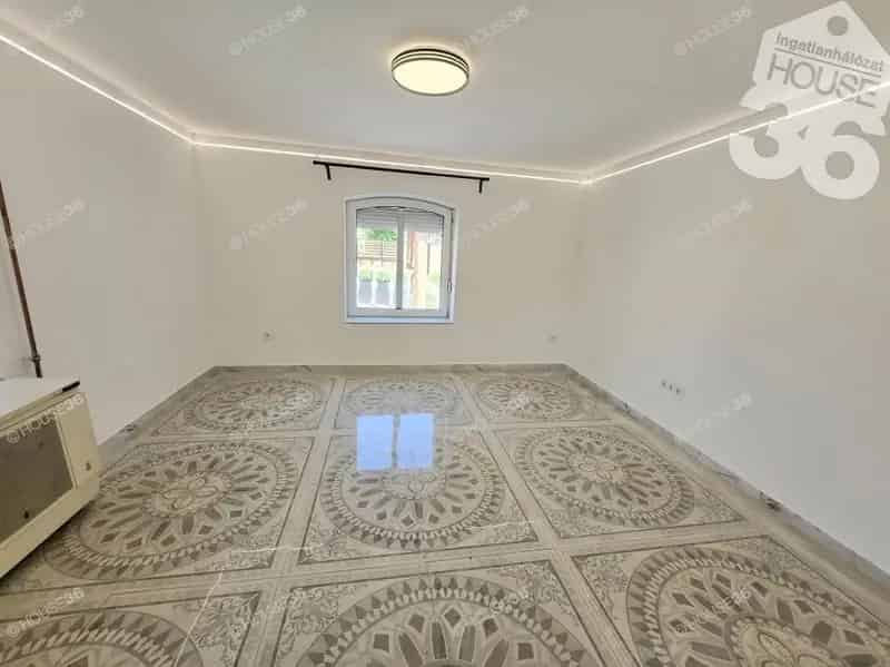 Szolnok kétrendbeli családi ház eladó 696 m2 telken