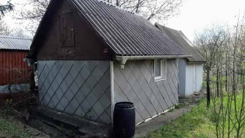 Öreghegyi úti telek kis házikóval - Turul