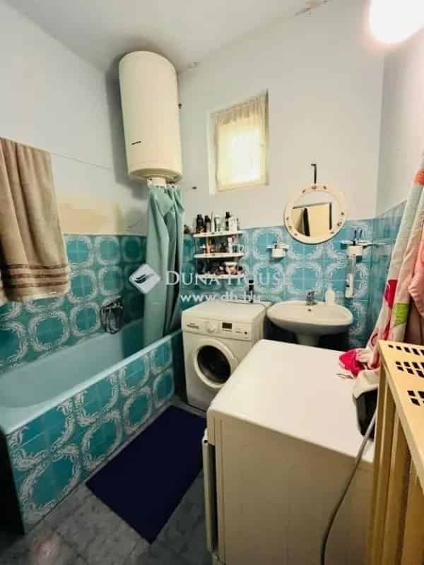 Mendei téglaház két generációnak, garázzsal