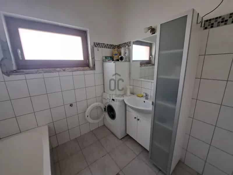 Farmoson 86 nm-es, 3 szobás ház eladó