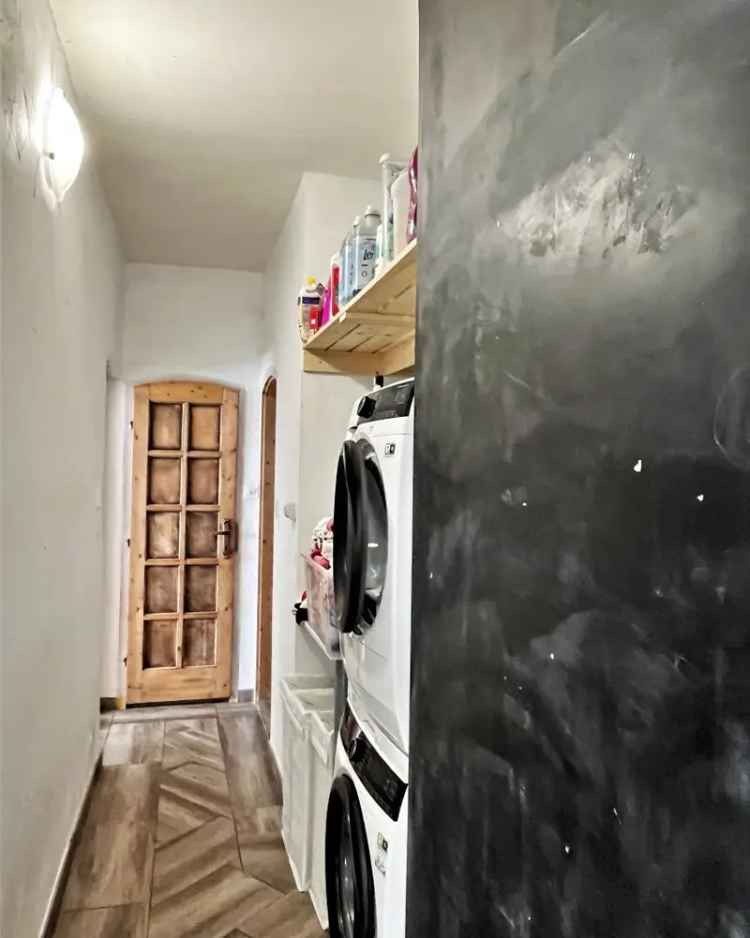 Rácalmás családi ház eladó - felújított, 2 garázs, 2 játszótér