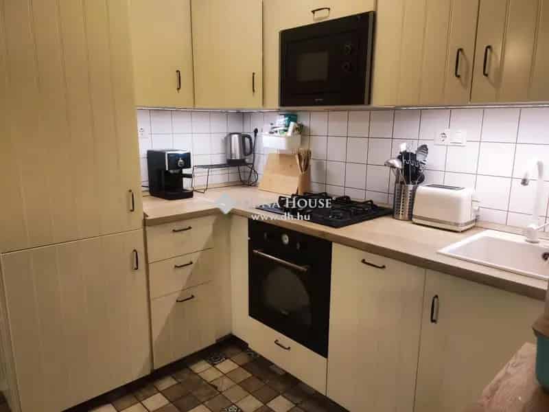 Családi ház eladó Pécsen nagy kerttel és apartmannal