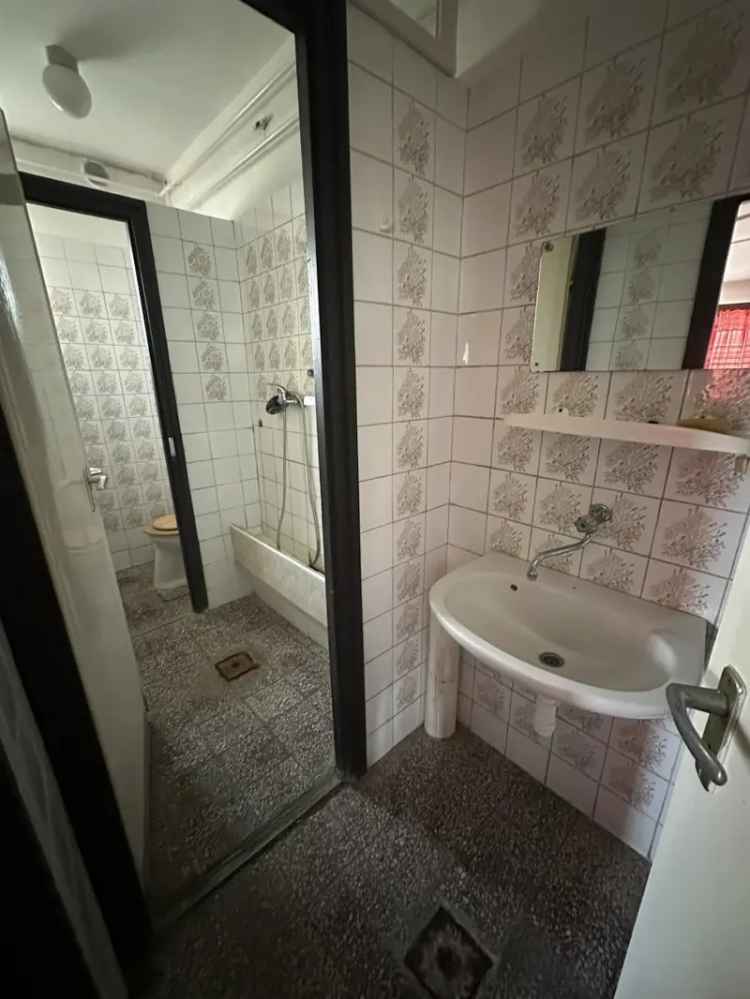 Komlói családi ház eladó vendéglátó egységgel