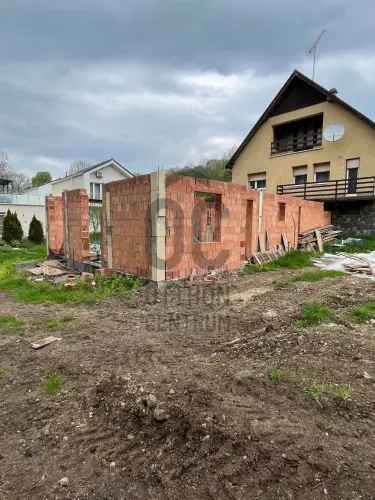 Szentendre eladó telek ikerház tervvel patakparton