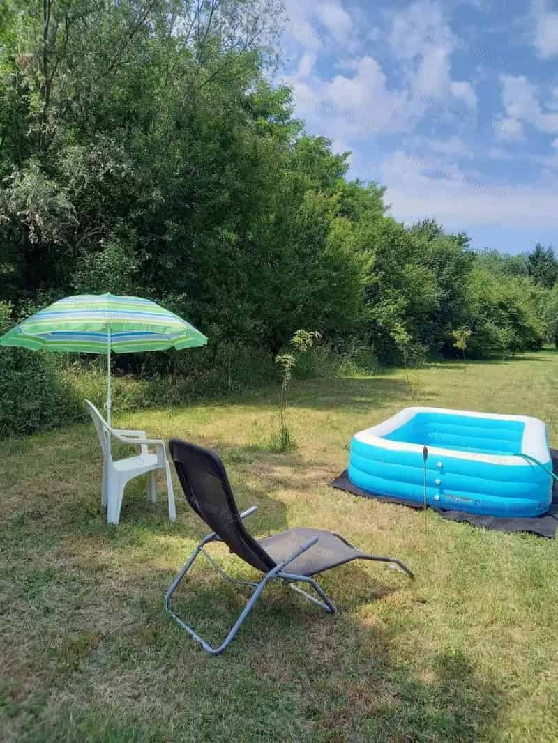 Kaposvári zártkerti telek eladó faházzal