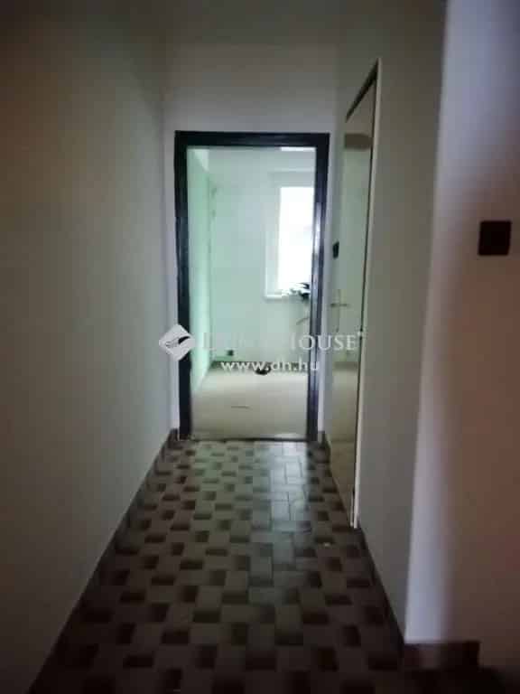 Komló Dávidföld 122 nm-es 3 szobás sorházi lakás garázzsal eladó