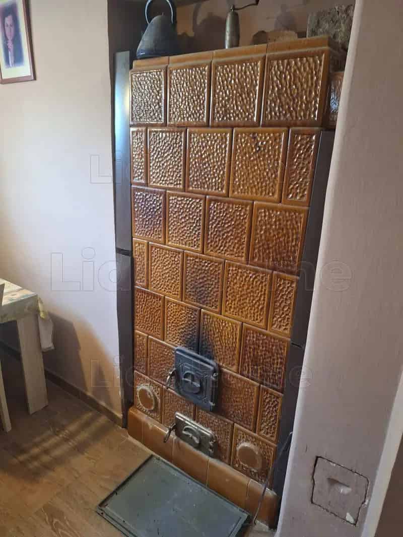 Dombóvári családi ház eladó - 3 szoba, garázs, nyári konyha