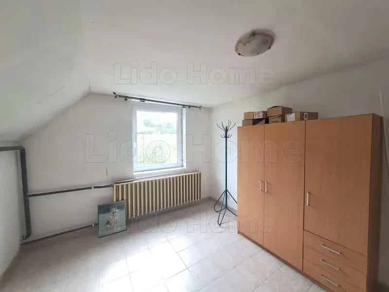 KISBUCSAI CSALÁDI HÁZ ELADÓ - 1197 NM TELEK
