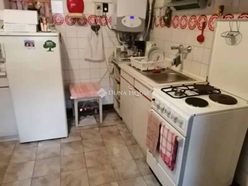 Debrecen belvárosában eladó üzlethelyiség és családi ház