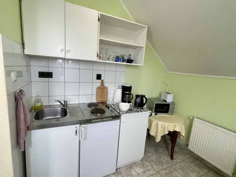 Hévízi családi ház eladó 5 apartmannal és üzlethelyiséggel