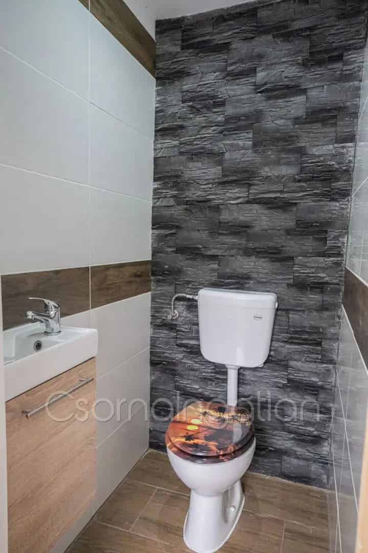Soboron 80 m2-es felújított családi ház eladó - garázs - tároló - falusi CSOK