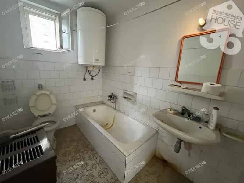 100 m2-es 3 szobás családi ház és 115 m2-es üzlethelyiség eladó