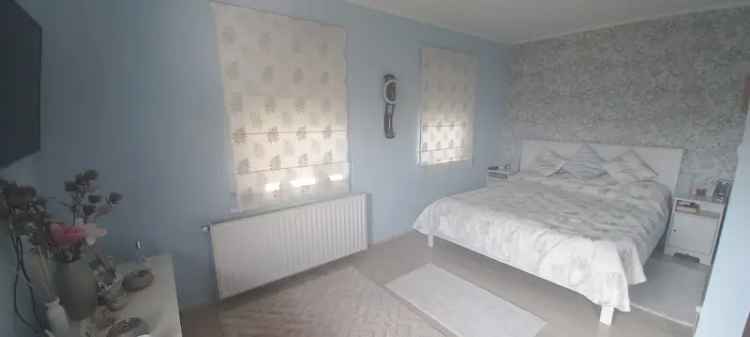 Pomáz panorámás családi ház eladó - A+++, jacuzzi, napelem