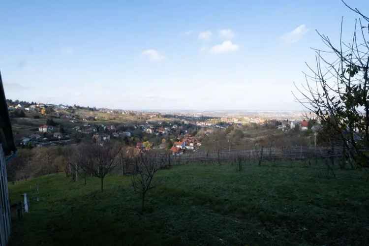 Eladó terület Egerszeghegyen kis épülettel panorámás kilátással