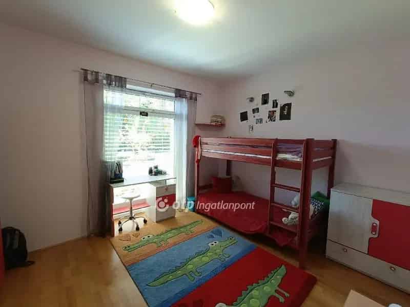 Ócsai 5 szobás passzív ház eladó 900m2-es telken